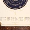 Lower section of the 2027 astronomical calendar with lunar phase symbols, celestial event dates and Ánima Oniris lettering.
